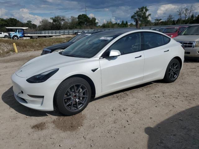 TESLA MODEL 3 2023 with VIN 5YJ3E1EAXPF453088 - Photo from auction