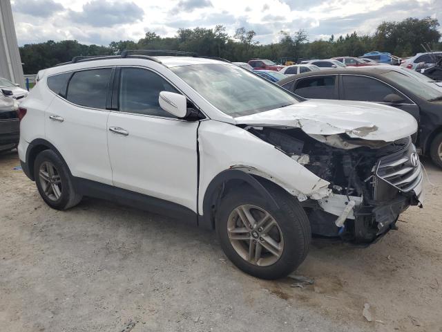 Photo 4 from auction – 2018 HYUNDAI SANTA FE S with VIN 5NMZU3LB1JH083546
