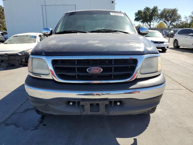 Photo 5 from auction – 2001 FORD F150 SUPER with VIN 1FTRW07W41KF71707