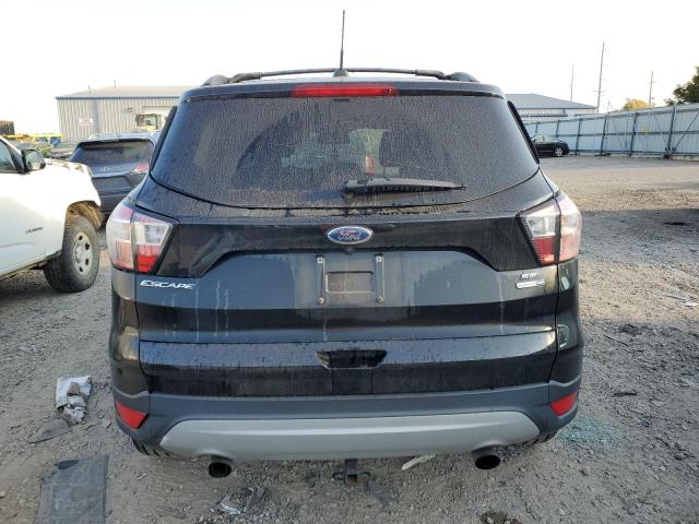 Photo 6 from auction – 2018 FORD ESCAPE SE with VIN 1FMCU9GD7JUD35843
