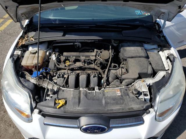 Photo 11 from auction – 2013 FORD FOCUS SE with VIN 1FADP3F24DL311478