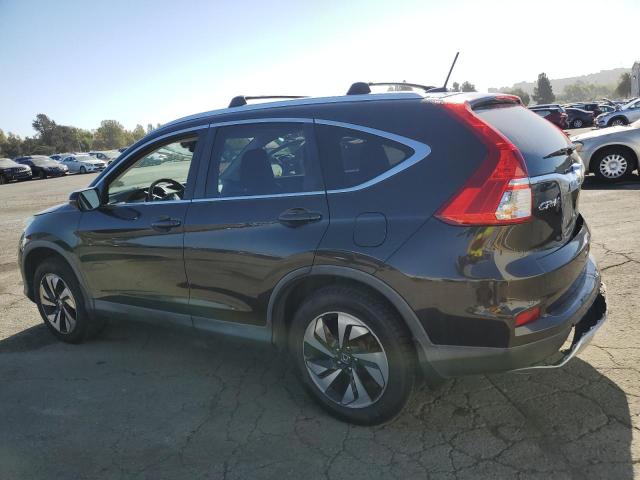 Photo 2 from auction – 2015 HONDA CR-V TOURI with VIN 5J6RM3H95FL011853