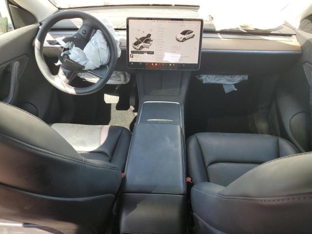 Photo 8 from auction – 2022 TESLA MODEL Y with VIN 7SAYGAEE2NF344854