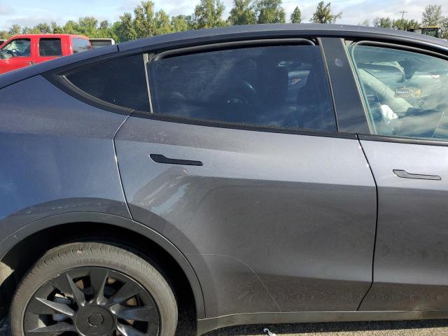 Photo 10 from auction – 2023 TESLA MODEL Y with VIN 7SAYGAEE1PF897207