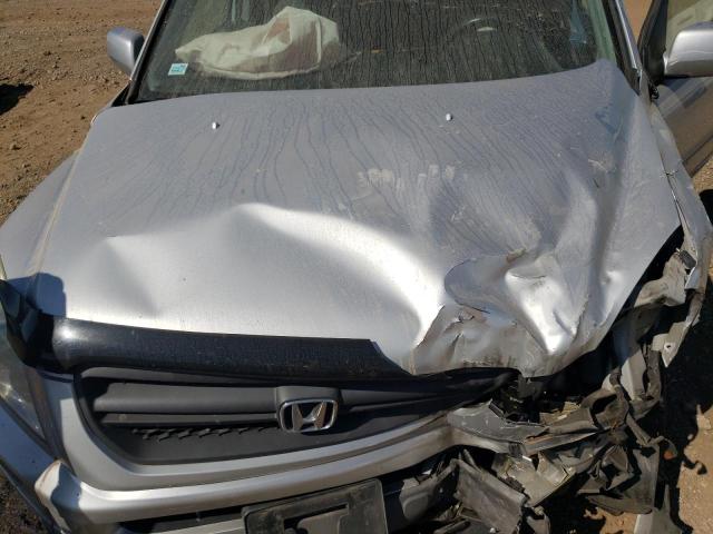 Photo 11 from auction – 2005 HONDA PILOT EX with VIN 5FNYF18475B054371