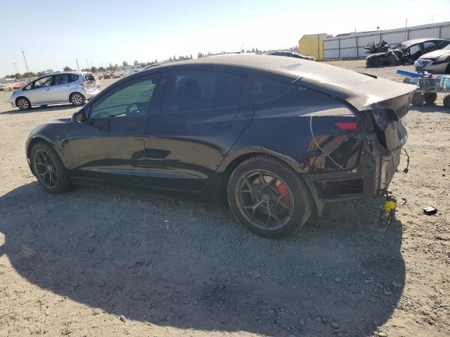 Photo 2 from auction – 2021 TESLA MODEL 3 with VIN 5YJ3E1EC1MF005769