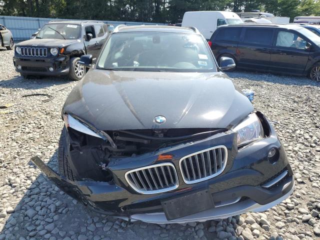 Photo 5 from auction – 2015 BMW X1 XDRIVE2 with VIN WBAVL1C56FVY26287