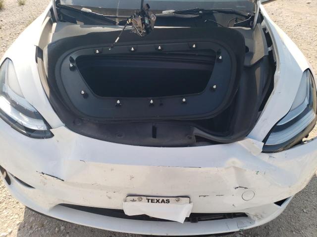 Photo 11 from auction – 2023 TESLA MODEL Y with VIN 7SAYGDEE4PA047747