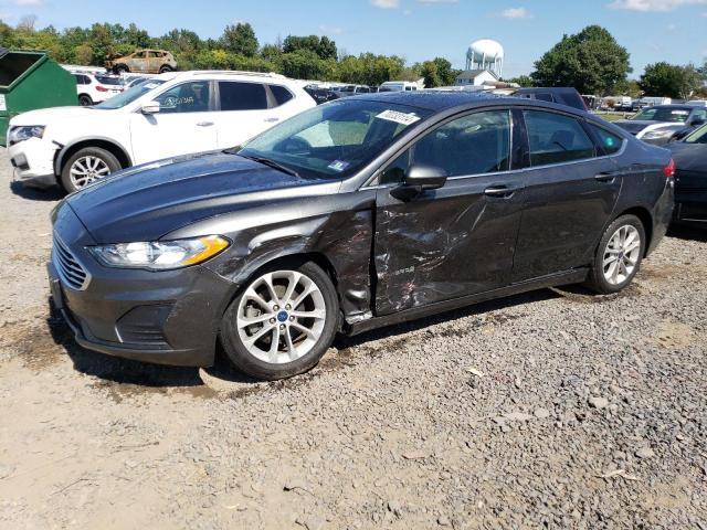 FORD FUSION SE 2019 with VIN 3FA6P0LU8KR212299 - Photo from auction