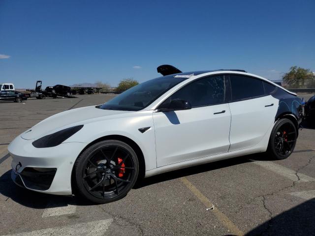 TESLA MODEL 3 2018 with VIN 5YJ3E1EB9JF082330 - Photo from auction
