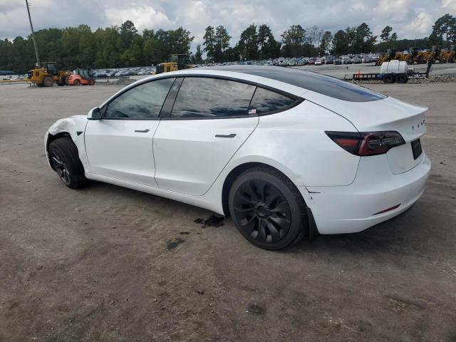 Photo 2 from auction – 2021 TESLA MODEL 3 with VIN 5YJ3E1EB8MF856040