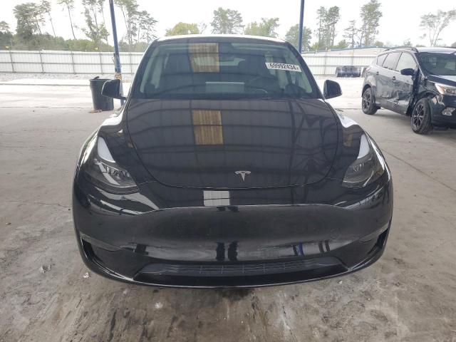 Photo 5 from auction – 2023 TESLA MODEL Y with VIN 7SAYGDEF7PF942838