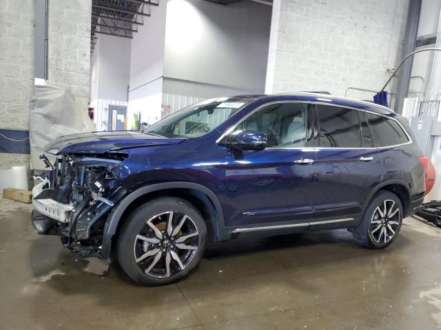 HONDA PILOT TOUR 2020 with VIN 5FNYF6H63LB019337 - Photo from auction