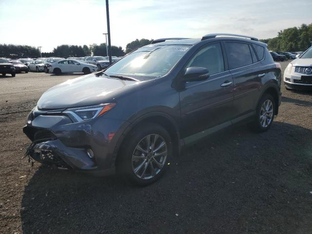TOYOTA RAV4 LIMIT 2016 with VIN JTMDFREV9GJ093064 - Photo from auction