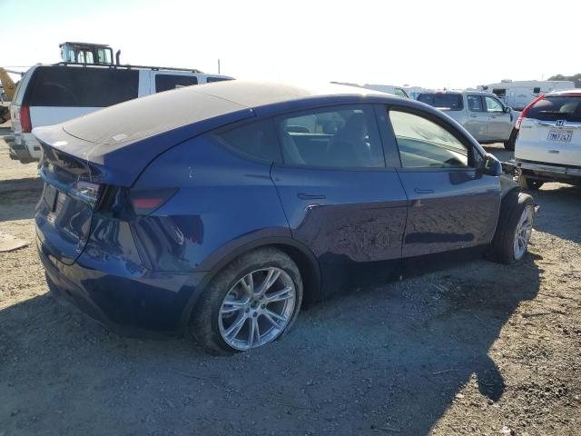 Photo 3 from auction – 2023 TESLA MODEL Y with VIN 7SAYGDEE7PF628033