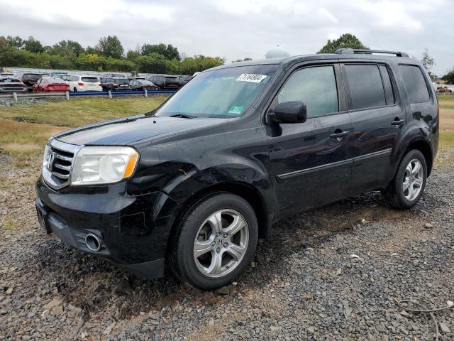 HONDA PILOT EXL 2015 with VIN 5FNYF4H6XFB005573 - Photo from auction