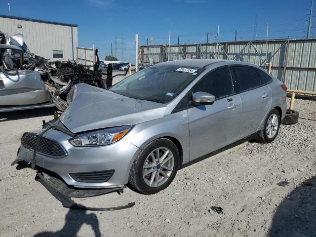 FORD FOCUS SE 2016 with VIN 1FADP3F24GL359910 - Photo from auction