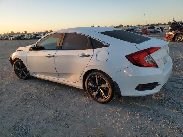 Photo 2 from auction – 2016 HONDA CIVIC TOUR with VIN 19XFC1F90GE221502