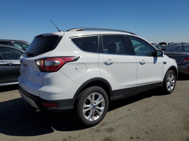 Photo 3 from auction – 2018 FORD ESCAPE SE with VIN 1FMCU9GD1JUB26209