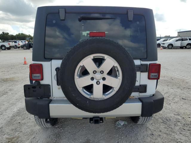 Photo 6 from auction – 2011 JEEP WRANGLER U with VIN 1J4BA5H19BL543259