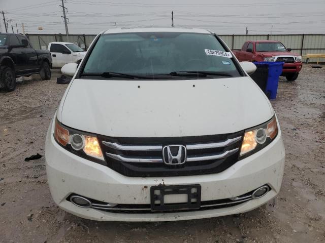 Photo 5 from auction – 2014 HONDA ODYSSEY TO with VIN 5FNRL5H91EB128500