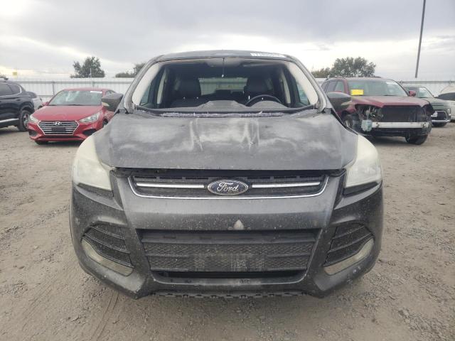 Photo 5 from auction – 2015 FORD ESCAPE TIT with VIN 1FMCU0J96FUA46881