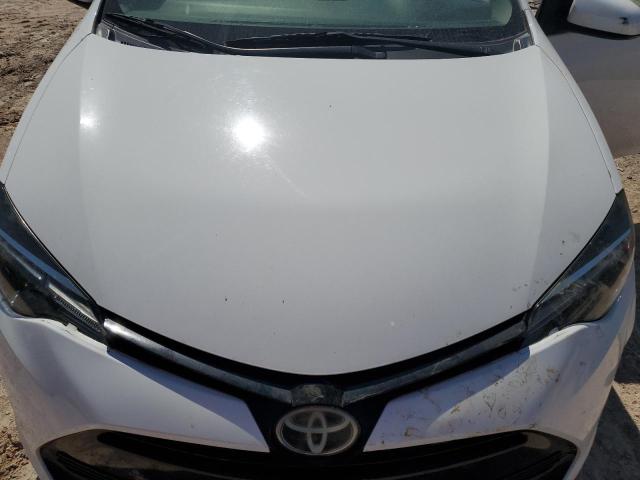 Photo 11 from auction – 2018 TOYOTA COROLLA L with VIN 2T1BURHE4JC121252