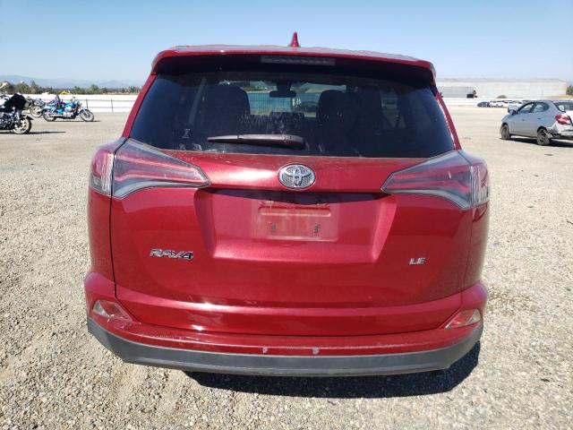 Photo 6 from auction – 2018 TOYOTA RAV4 LE with VIN JTMZFREV2JD130404