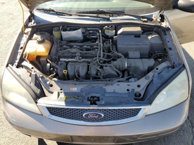 Photo 11 from auction – 2005 FORD FOCUS ZX4 with VIN 1FAFP34N25W290359