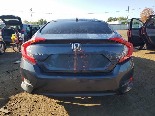 Photo 6 from auction – 2018 HONDA CIVIC EX with VIN 2HGFC2F74JH584726