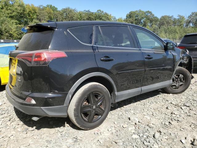 Photo 3 from auction – 2018 TOYOTA RAV4 LE with VIN 2T3BFREV4JW710435