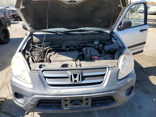 Photo 12 from auction – 2006 HONDA CR-V LX with VIN JHLRD68516C003501