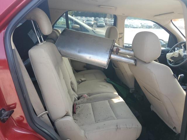 Photo 11 from auction – 2009 FORD TAURUS X S with VIN 1FMDK02W29GA04211