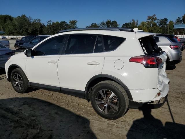 Photo 2 from auction – 2017 TOYOTA RAV4 XLE with VIN JTMRFREV0HJ704655
