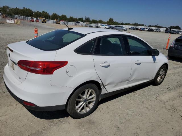 Photo 3 from auction – 2018 FORD FOCUS SE with VIN 1FADP3F2XJL219870