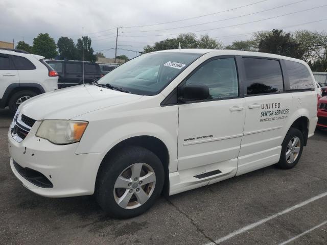 DODGE GRAND CARA 2013 with VIN 2C4RDGBG7DR780962 - Photo from auction