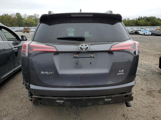 Photo 6 from auction – 2018 TOYOTA RAV4 LE with VIN JTMBFREV6JJ225535