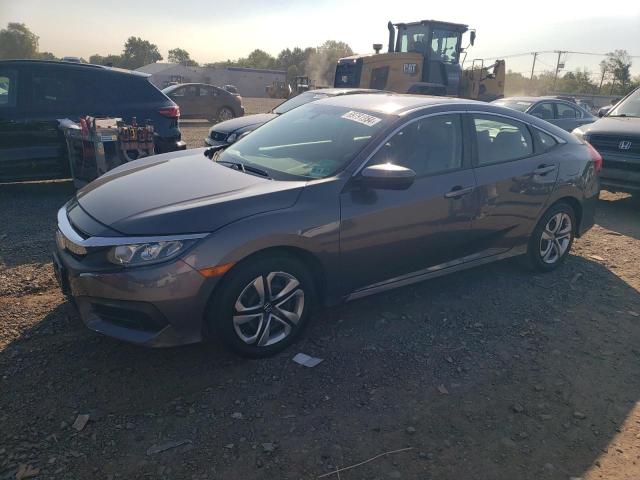 HONDA CIVIC LX 2018 with VIN 2HGFC2F58JH546771 - Photo from auction