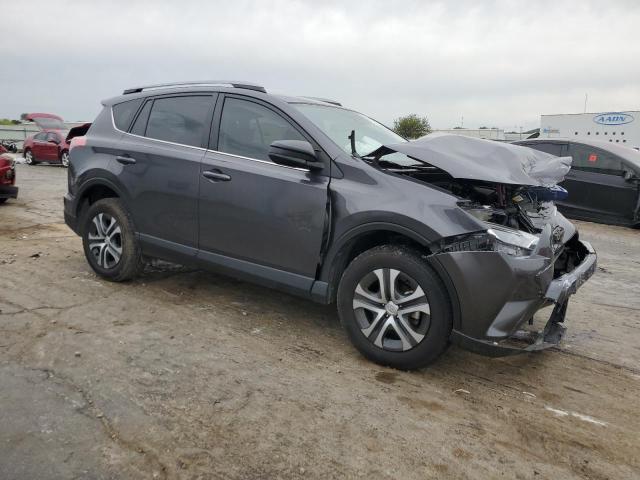 Photo 4 from auction – 2017 TOYOTA RAV4 LE with VIN JTMZFREV6HJ125850