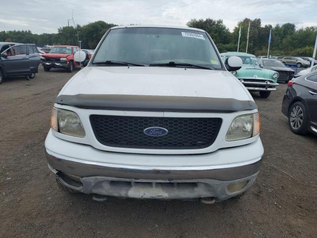 Photo 5 from auction – 2000 FORD F150 with VIN 1FTRX18LXYKA81676