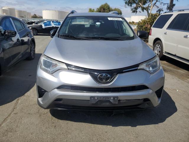 Photo 5 from auction – 2018 TOYOTA RAV4 LE with VIN JTMZFREV2JD129348