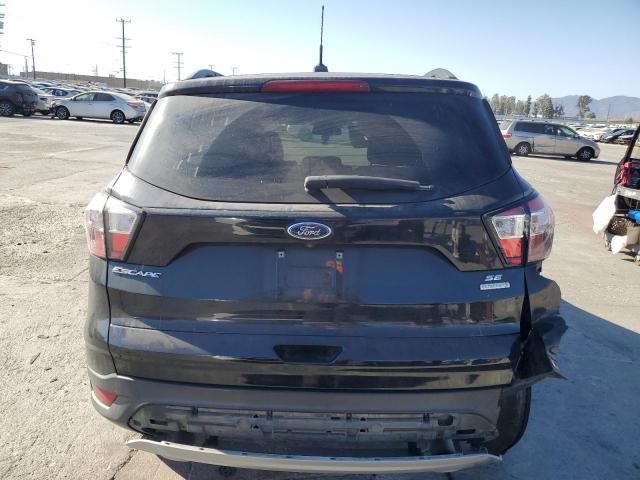 Photo 6 from auction – 2018 FORD ESCAPE SE with VIN 1FMCU0GD6JUB75742