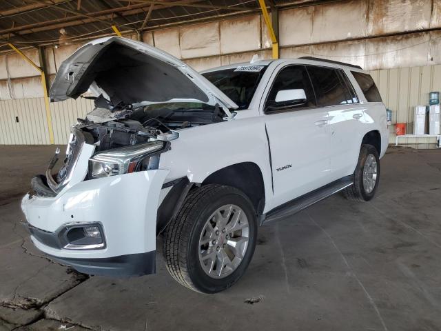 GMC YUKON SLE 2015 with VIN 1GKS2AKC2FR733014 - Photo from auction
