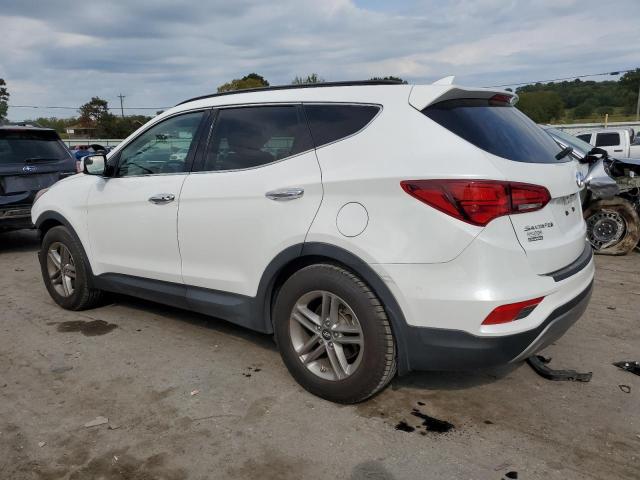Photo 2 from auction – 2017 HYUNDAI SANTA FE S with VIN 5NMZU3LB0HH049219