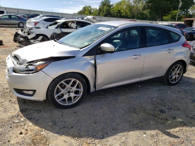 FORD FOCUS SE 2015 with VIN 1FADP3K2XFL319738 - Photo from auction