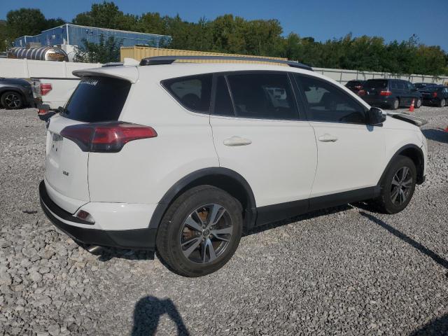 Photo 3 from auction – 2017 TOYOTA RAV4 XLE with VIN JTMWFREV6HD095881
