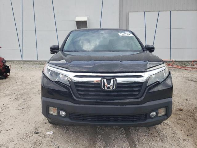 Photo 5 from auction – 2017 HONDA RIDGELINE with VIN 5FPYK3F61HB019672