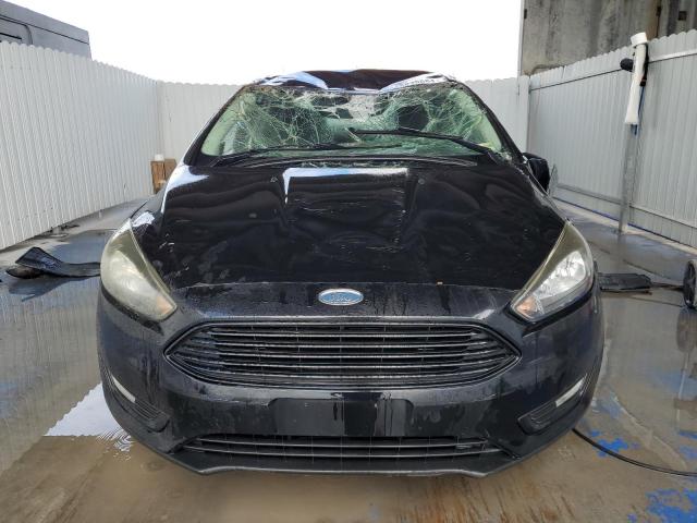 Photo 5 from auction – 2017 FORD FOCUS SE with VIN 1FADP3FE2HL242595