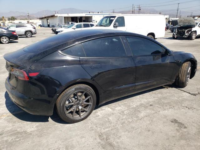 Снимка 3 от търг – 2023 TESLA MODEL 3 с VIN 5YJ3E1EA3PF705022