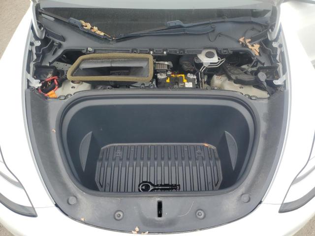 Photo 12 from auction – 2021 TESLA MODEL Y with VIN 5YJYGDEE2MF065739